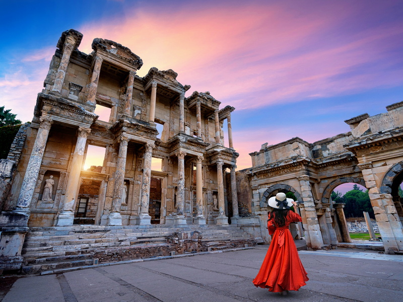 woman-standing-celsus-library-ephesus-ancient-city-izmir-turkey